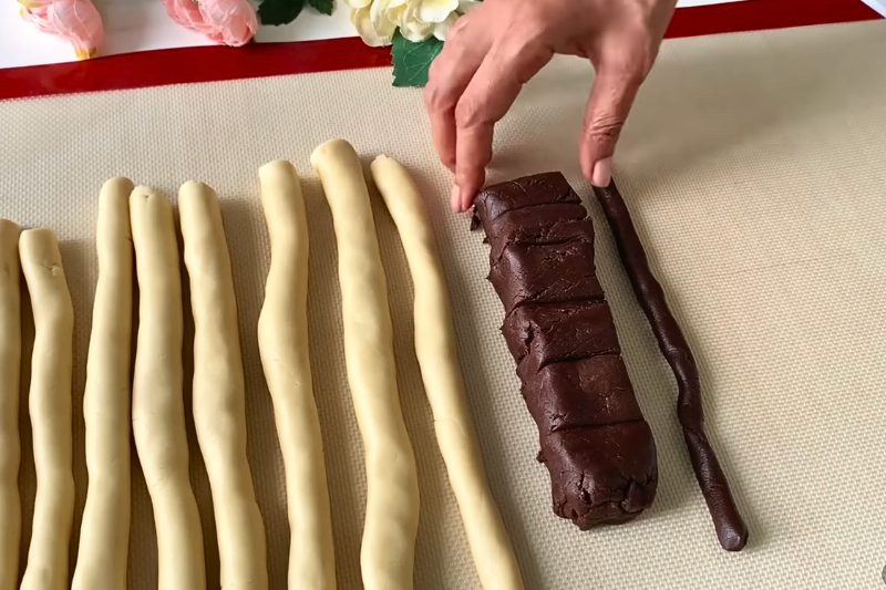 Baked marble butter cookies with golden edges and layered chocolate and vanilla pattern